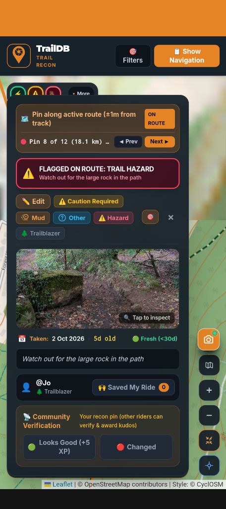 Flagged trail hazard warning and surface intel card in TrailDB